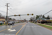 A photograph of a Pedestrian Hybrid Beacon (PHB) at a crossing in Vienna, VA.